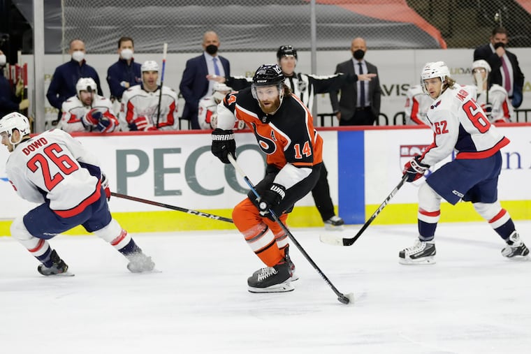 Flyers center Sean Couturier (14) is expected back Monday after missing Saturday's loss to the Islanders.