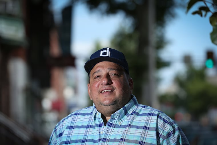 John Luciano, better known as DJ Johnny Looch, poses for a portrait along South Broad Street in Philadelphia, Pa. on June 25, 2020. Looch, a longtime DJ, did 89 straight shows on periscope just to entertain people during the pandemic.
