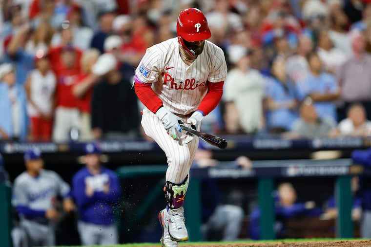 Phillies Bryce Harper drops his head after flying out to end eighth inning against the Los Angeles Dodgers during Game 2 of the NLDS on Monday, October 6, 2025 in Philadelphia.