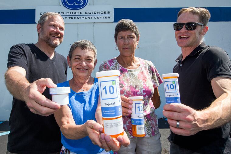From left, Peter Rosenfeld, Harriet Berkey, Sonia Armstrong, and Jay Lassiter hold new cannabis
products.