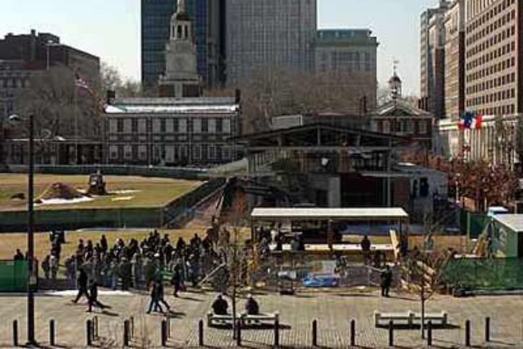 In this 2007 file photo, guests and dignitaries gather at the Independence National Historical Park where president George Washington kept slaves for the ceremonial ground-breaking for a monument at the site. (Tom Gralish / Staff Photographer)