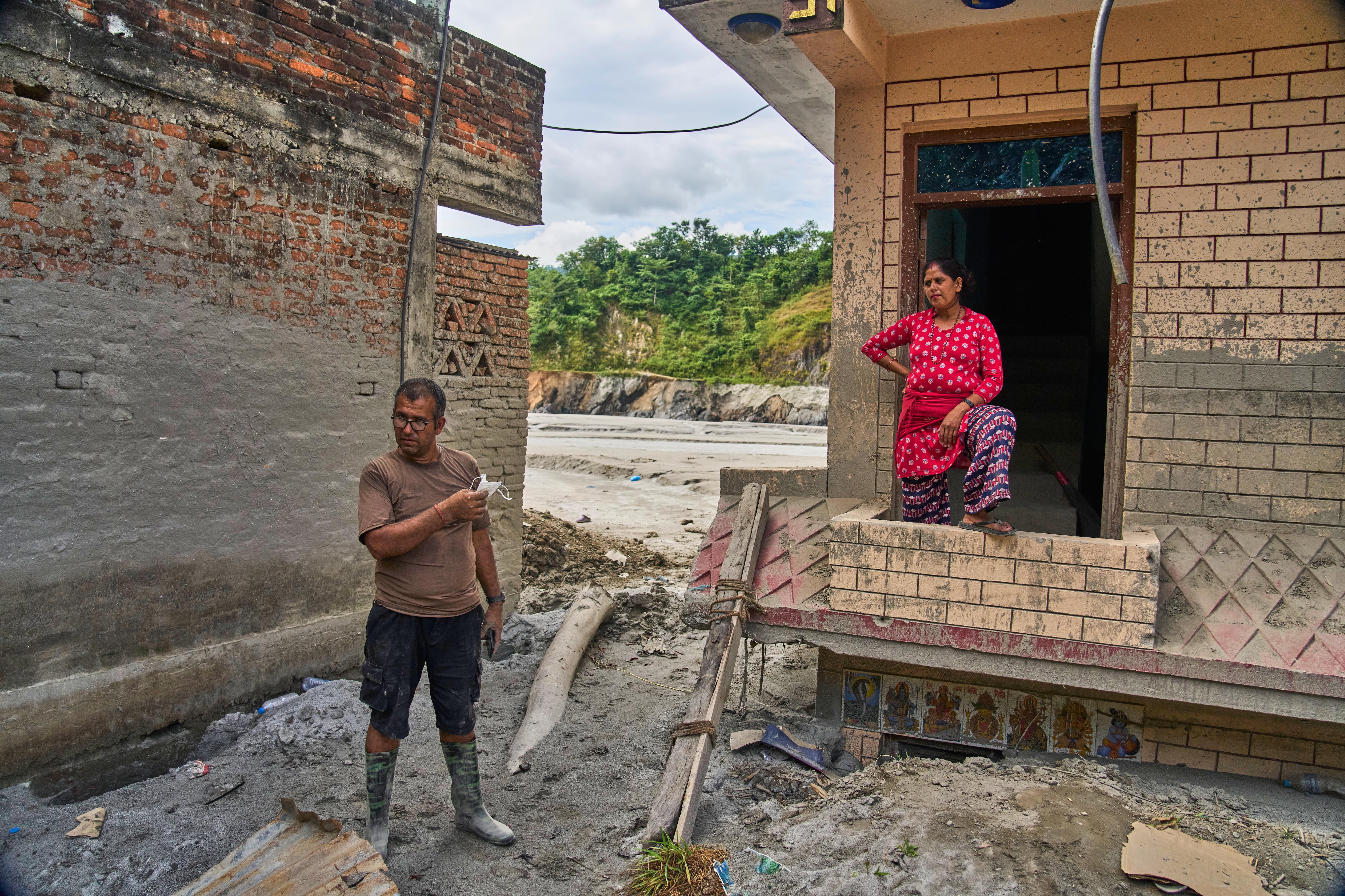 A month after Nepal floods, thousands are still missing and families face a long recovery