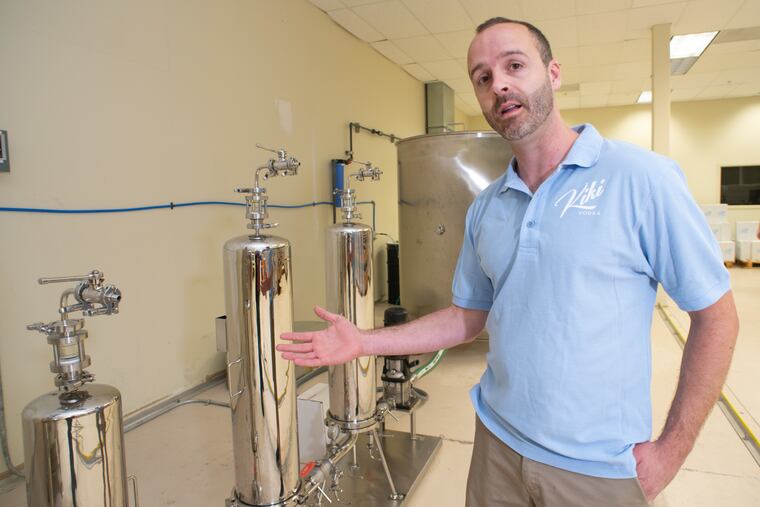 John Jameson explains the process of making vodka at his Kiki Vodka company warehouse in Hatfield.