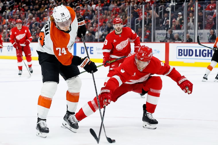 Flyers right wing Owen Tippett (left) attempts a shot during the second period.