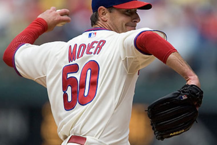 "He's sure in his ways and, to me, that's growth," Jamie Moyer said of Carlos Ruiz. (Ed Hille/Staff file photo)