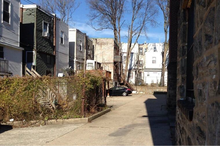 The rear alley of the 200 block of South 49th Street in West Philadelphia, where the burned body of 15-year-old Sabriya McLean was found Tuesday, Nov. 28, 2017.