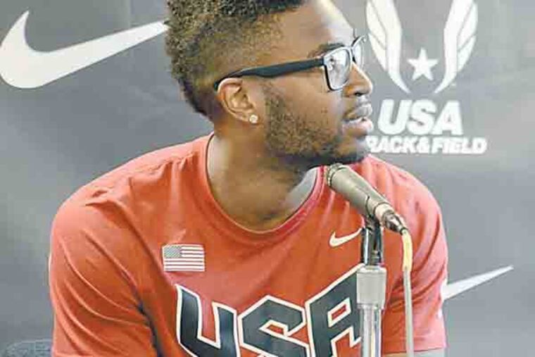 Manteo Mitchell, who was running a leg for the U.S. team during the 4x400-meter relay qualifying at the Olympics when a bone in his leg snapped, speaks at a press conference at the Penn Relays April 26, 2103. Saturday will mark his first competition since the injury. ( TOM GRALISH / Staff Photographer )