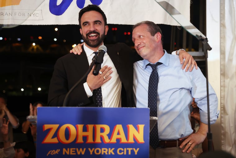 Democratic mayoral candidate Zohran Mamdani (left) speaks on stage with fellow candidate, Comptroller Brad Lander, at his primary election party, Wednesday in New York.