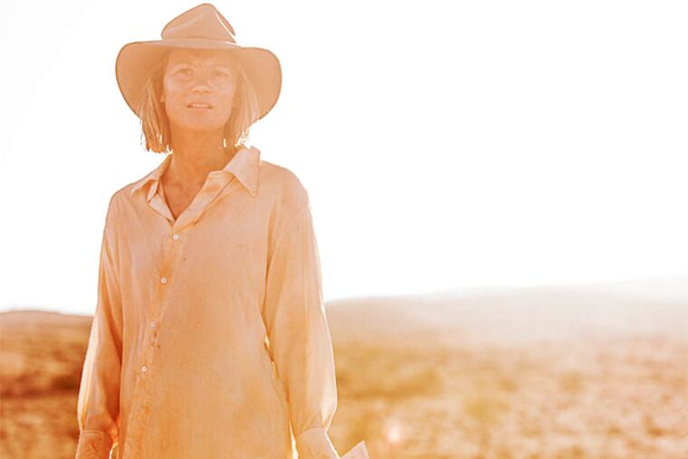 Mia Wasikowska is Robyn Davidson in "Tracks," the story of a young woman who makes a solo trek through almost 2,000 miles of the Australian desert. (The Weinstein Company)