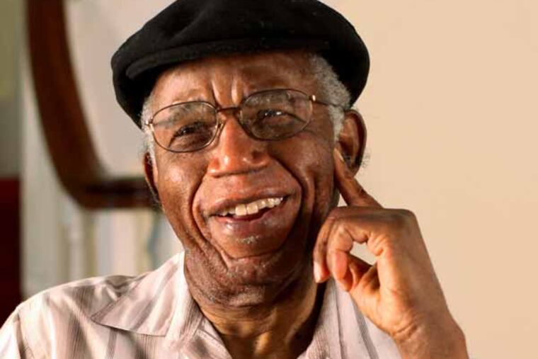 This undated photo provided by Brown University shows Chinua Achebe at his home in Warwick, R.I. Achebe, an internationally celebrated Nigerian author, statesman and dissident, has died at age 82. Achebe's 1958 novel, "Things Fall Apart," is widely regarded as the first major work of modern African fiction and inspired others to tell the continent's story through the eyes of those who lived there. He joined Brown University in 2009 as a professor of languages and literature. (AP Photo/Brown University, Mike Cohea)