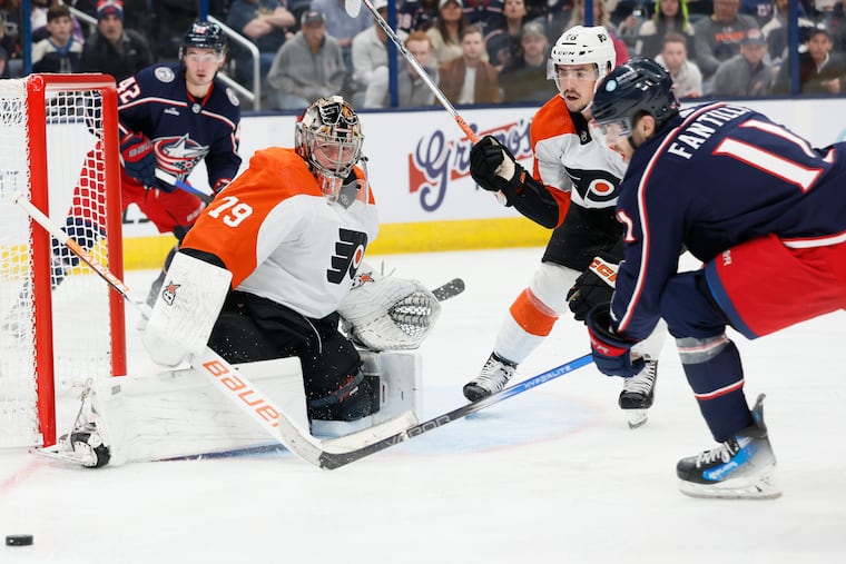 Carter Hart makes a save against the Blue Jackets' Adam Fantilli.