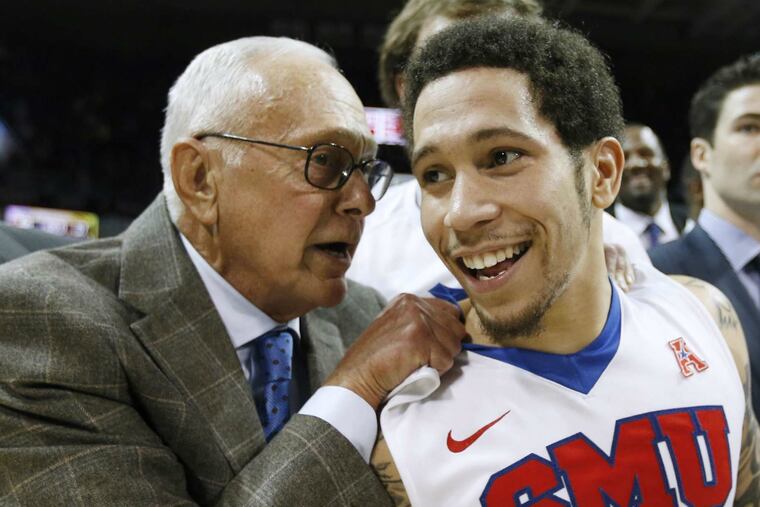 SMU coach Larry Brown with guard Nic Moore.