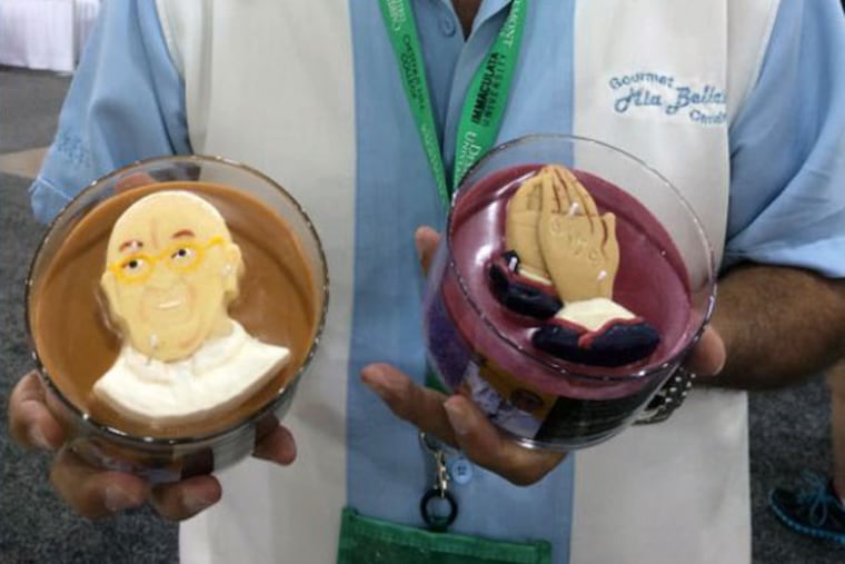 Limited edition scented candles in honor of the pope. (WILLIAM BENDER/Daily News Staff)