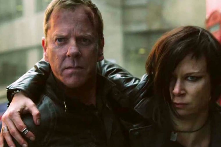 DVDFEA03 – Kiefer Sutherland returns as maverick federal agent Jack Bauer in a revival of the popular FOX TV show “24.” Titled “24: Live Another Day,” it is set eight years after the regular series ended. Photo shows star Sutherland and Mary Lynn Rajskub, who plays his old friend and fellow agent Chloe.