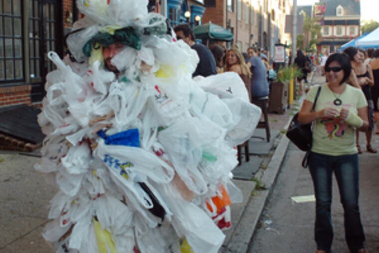 "Bag Monster" Justin Brame's outfit at Greenfest Philly is made of 500 plastic bags. That's the annual per-capita use, he says.