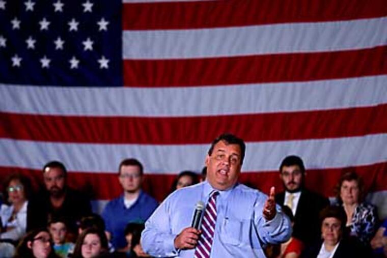 New Jersey Gov. Chris Christie fields a question at a town hall meeting inside of the gymnasium at the East Brunswick Jewish Center, in East Brunswick, N.J., Thursday, May 31, 2012. (AP Photo/Home News Tribune, Mark R. Sullivan) NEWARK OUT; NO SALES