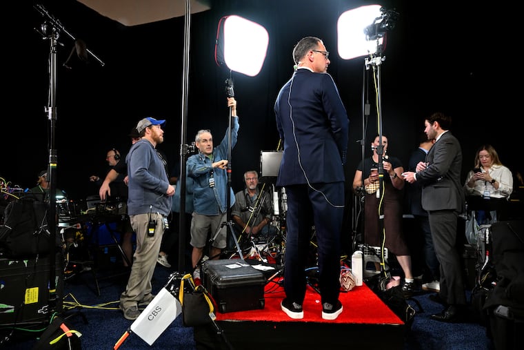Gov. Josh Shapiro is interviewed by TV news in the spin room at the Convention Center following the debate between former President Donald Trump and Vice President Kamala Harris on Tuesday, Sept. 10, 2024.