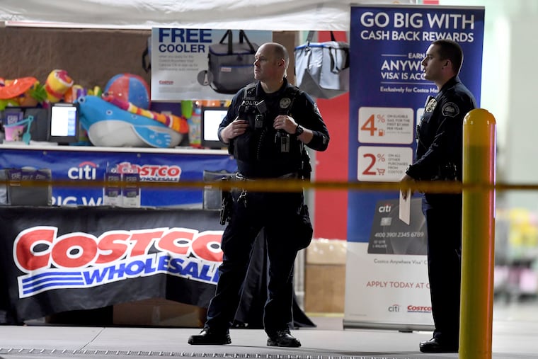 The Corona police department investigate a shooting inside a Costco in Corona, Calif., Friday, June 14, 2019. A gunman opened fire inside the store during an argument, killing a man, wounding two other people and sparking a stampede of terrified shoppers before he was taken into custody, police said. The man involved in the argument was killed and two other people were wounded, Corona police Lt. Jeff Edwards said. (Will Lester/Inland Valley Daily Bulletin/SCNG via AP)