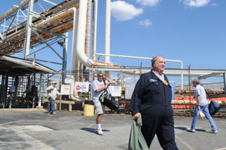 Shift change at 4 pm July 2, 2012 at the old Conoco oil refinery in Trainer which is back up and running under the auspices of Monroe Energy, a subsidiary of Delta Airlines, which will use the plant to make fuel for its airlines. Stephen Kokas (foreground), 60, a 36-year-emloyee at this refinery (under multiple owners) was one of the workers called back to work when the plant opened. ( CLEM MURRAY / Staff Photographer )