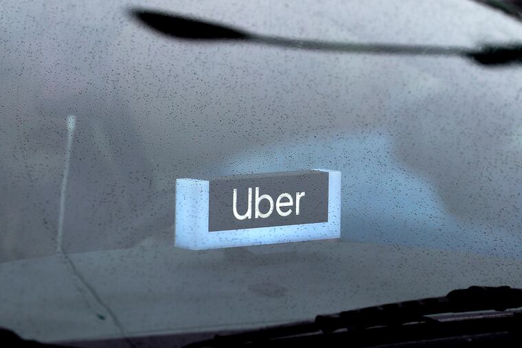 File photo of an Uber sign.