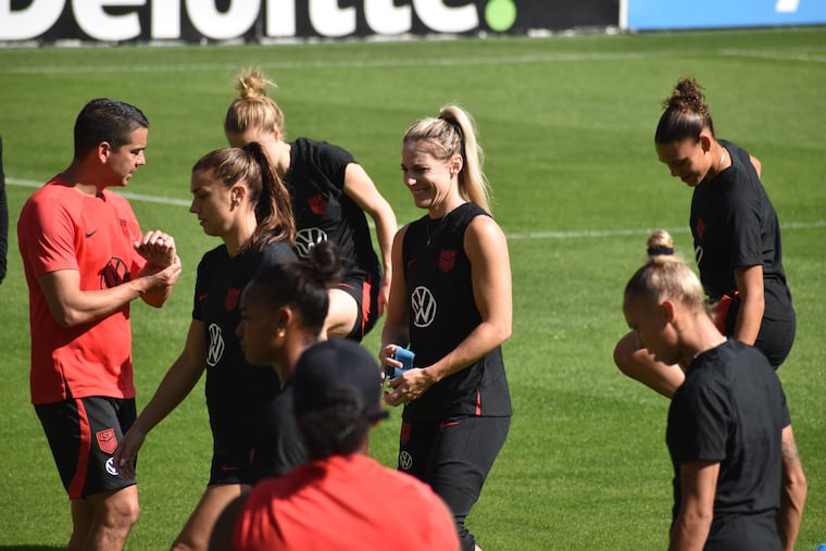 Julie Ertz (center) smiles during the U.S. women's national soccer team's practice Wednesday in Cincinnati.