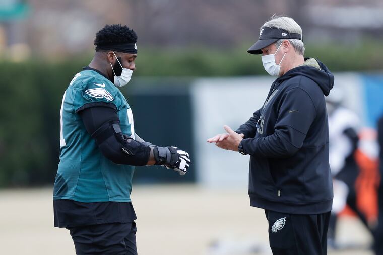 Both coach Doug Pederson (right) and lineman Jason Peters have a lot at stake in the next few games. Their jobs may be on the line.