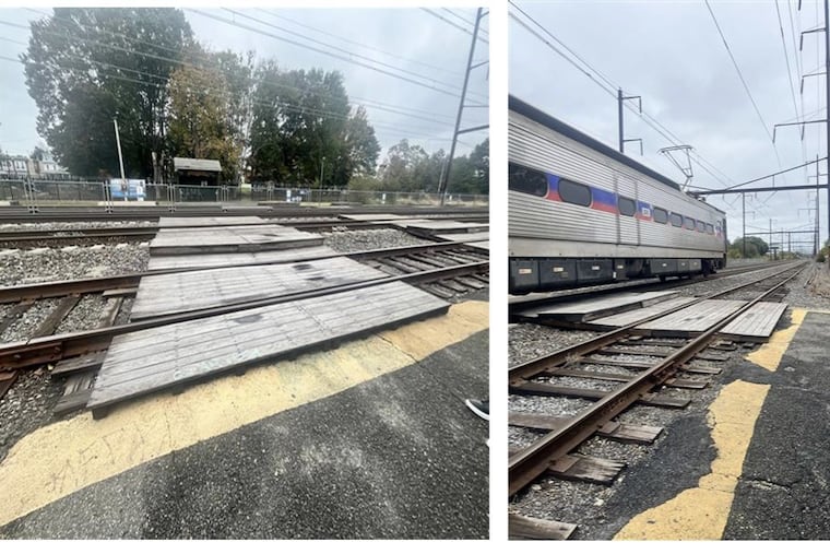 The wooden planks that cover the tracks at the Tacony Regional Railroad station.