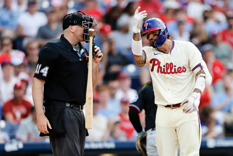 Nick Castellanos tosses his bat after striking looking to end the eight inning against the Marlins on Saturday.