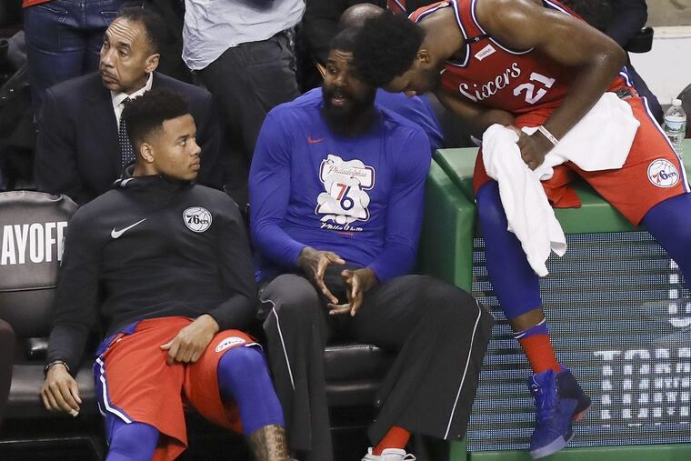 Markelle Fultz, left, has yet to see action against the Boston Celtics in the Eastern Conference semifinals.