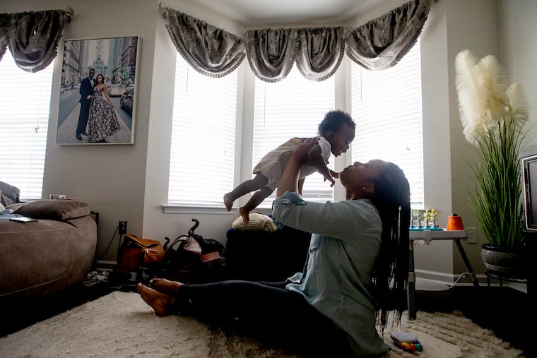 Lakeisha Faulkner Jenkins holds her 9-month-old son Kairo Ahmaad Jenkins on June18, 2022 in their Drexel Hill home.