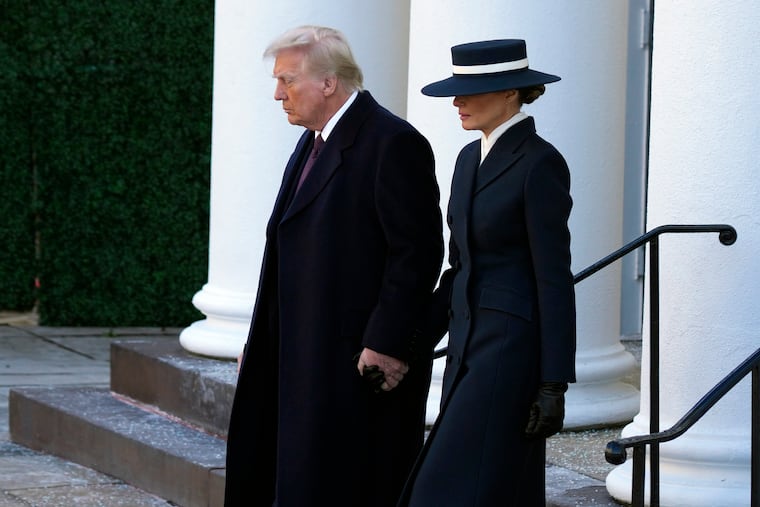 President-elect Donald Trump walks with his wife Melania after a church service at St. John's Episcopal Church across from the White House in Washington, Monday, Jan. 20, 2025, on Donald Trump's inauguration day. (AP Photo/Matt Rourke)