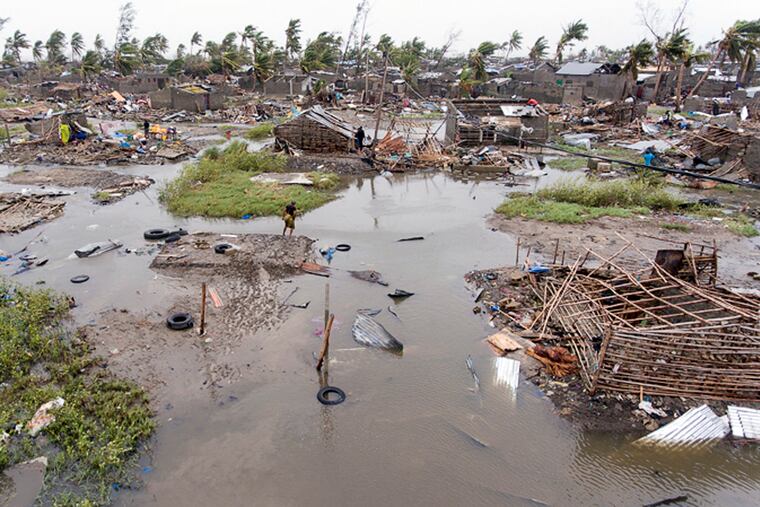 In this photo taken on Friday, March 15, 2019 and provided by the International Red Cross, an aerial view of the destruction of homes after Tropical Cyclone Idai, in Beira, Mozambique. Mozambique's President Filipe Nyusi says that more than 1,000 may have by killed by Cyclone Idai, which many say is the worst in more than 20 years. Speaking to state Radio Mozambique, Nyusi said Monday, March 18 that although the official death count is currently 84, he believes the toll will be more than 1,000. (Denis Onyodi/IFRC via AP)
