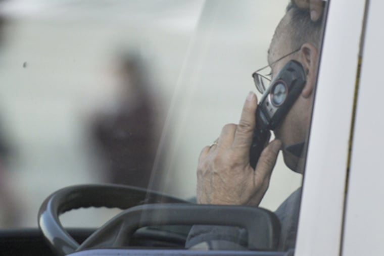 Using the phone while driving will be legal again in Philadelphia come March 8, thanks to the Pennsylvania legislature. (Tom Gralish / Staff Photographer)