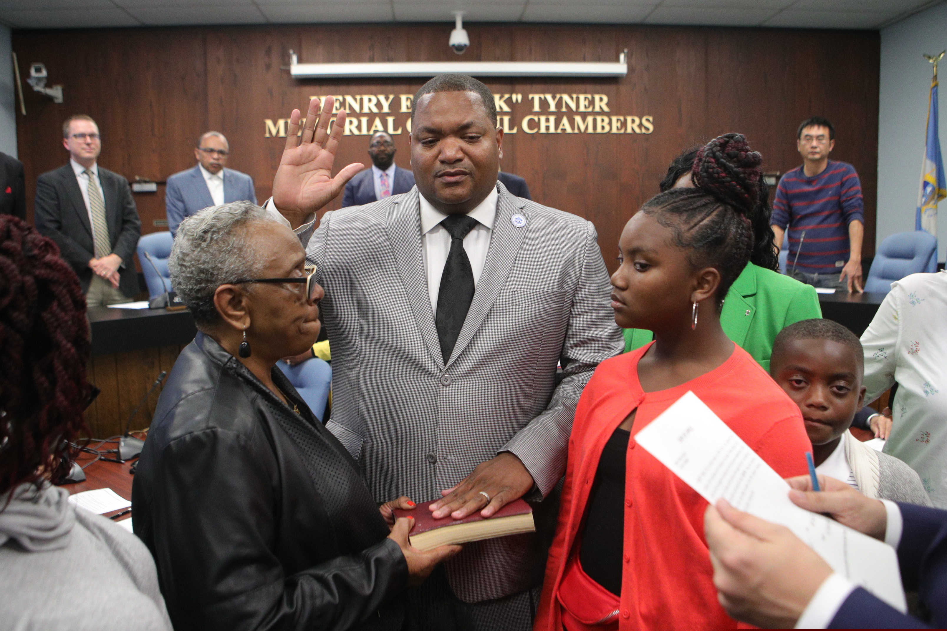 Verona Tally, left holds the bible as Marty Small Sr., center, is sworn in as mayor of Atlantic City in October at Atlantic City Hall. Small, the incumbent who is seeking a 1-year term, is running in the Democratic primary against Pamela Thomas-Fields, a long-time city worker in the planning and economic development department, and James Whitehead, a Navy veteran and humanitarian aid organizer.