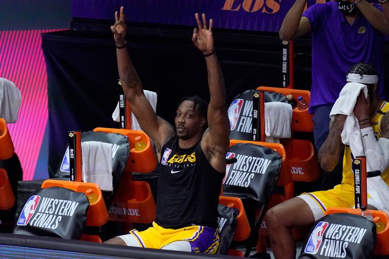 Dwight Howard celebrates late in a Western Conference finals game between his Lakers and the Nuggets in September.