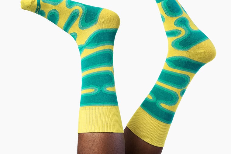 Shoppers are steering toward thrifty gifts like socks this year.