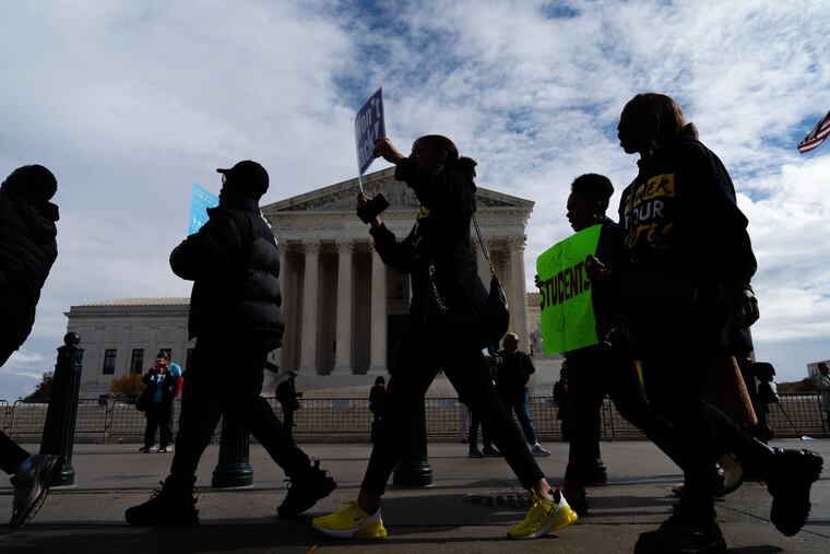 Supporters march during a rally in support of affirmative action policies outside the U.S. Supreme Court in Washington on Oct. 31.
