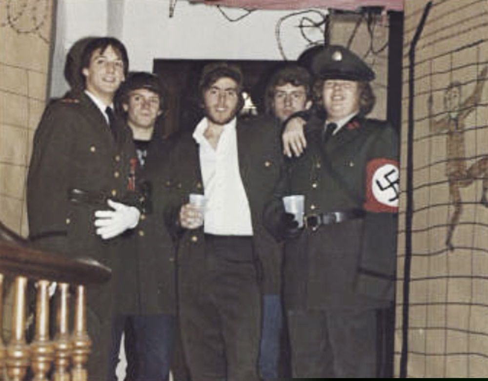 In this photo from the 1980 edition of Spectrum, the Gettysburg College yearbook, Bob Garthwait, right, wears a costume that depicts a Nazi uniform at a fraternity event. Garthwait, a financial donor and college trustee, apologized and announced his resignation from the board of trustees Tuesday, Feb. 19, 2019.