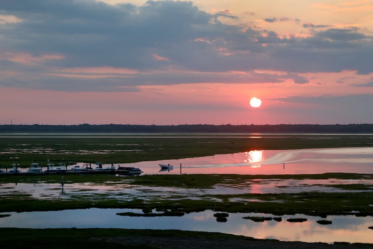 The sun sets over the the inland waterway in Strathmere, on June 29, 2026.
