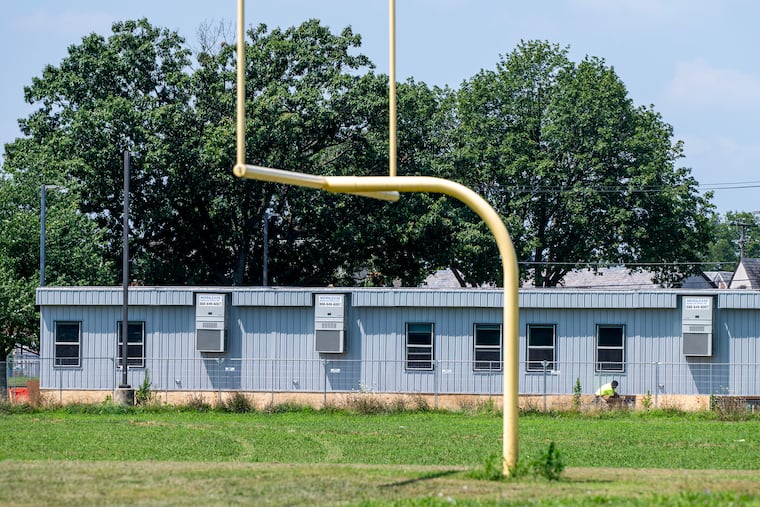 Trailers that will house an extra 900 students at Lincoln High School are seen from the front of the school, looking west toward Ryan Avenue in Northeast Philadelphia.