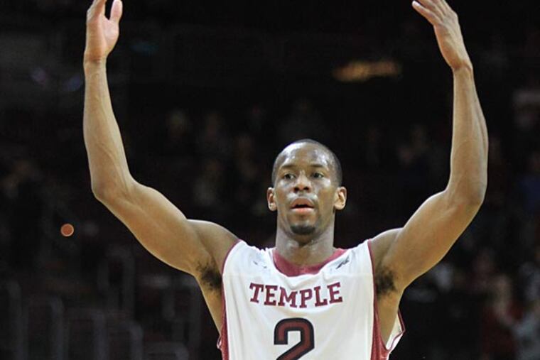 Temple's Will Cummings encourages the cheering of the fans. (Charles Fox/Staff Photographer)