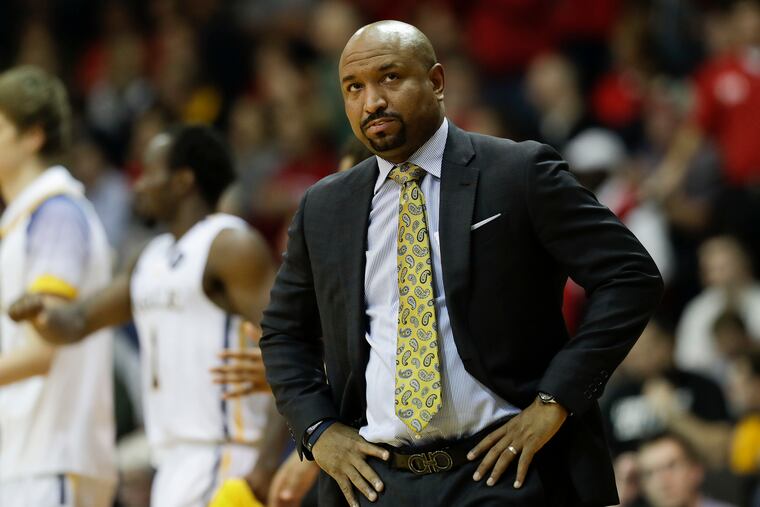 La Salle coach Ashley Howard looks up during a second-half timeout against Dayton.