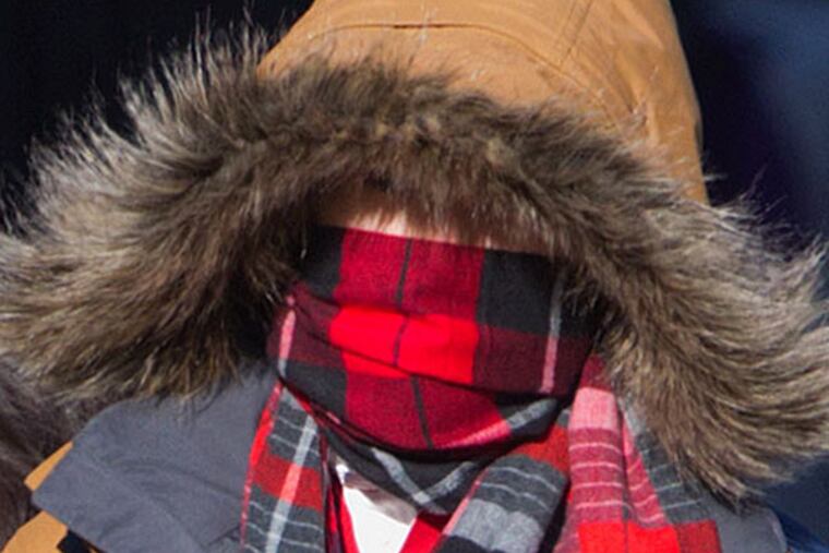 A University of Pennsylvania student braves the bitter weather during a cold snap in November.