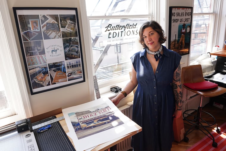 Katie Tackman, a photographer, fine art printer, and one of the founders of Artists for Immigrant Rights, shown here in her studio, Butterfield Editions, where she makes fine art prints, in Philadelphia on May 28.