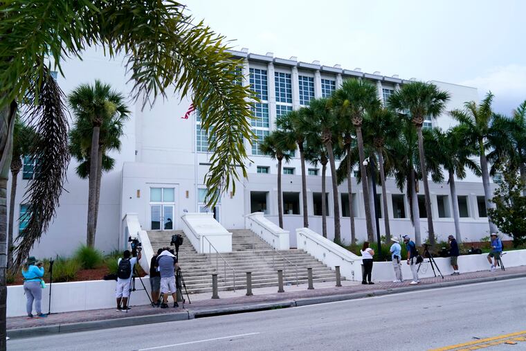 News media wait outside of the Alto Lee Adams Sr. U.S. Courthouse where their is a pretrial conference to discuss procedures for handling classified information in the case against former President Donald Trump.