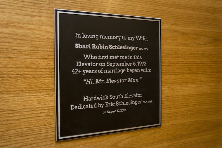 A plaque hangs outside the Temple University elevator where Shari Rubin Schlesinger first saw Eric in 1972 and love later bloomed.