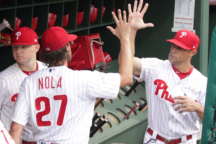 Gabe Kapler is keeping Aaron Nola (left) on the mound each fifth day.