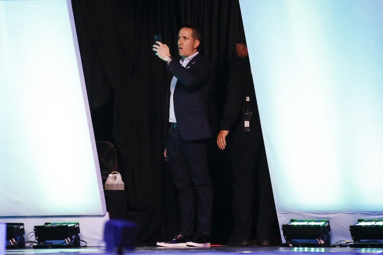 Eagles executive vice president of football operations Howie Roseman recording Super Bowl media night on Monday.