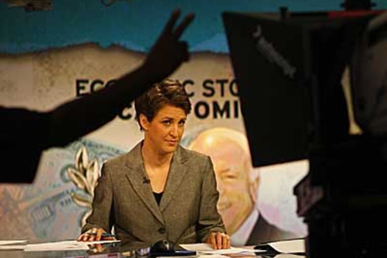 Rachel Maddow gets the cue, 2 seconds to air. (MICHAEL S. WIRTZ / Inquirer)