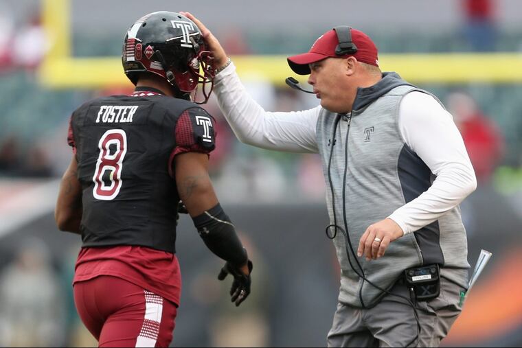Temple head coach Geoff Collins talks with defensive back Artrel Foster (8) during a game against UCF at Lincoln Financial Field on Saturday, Nov 18, 2017. TIM TAI / Staff Photographer